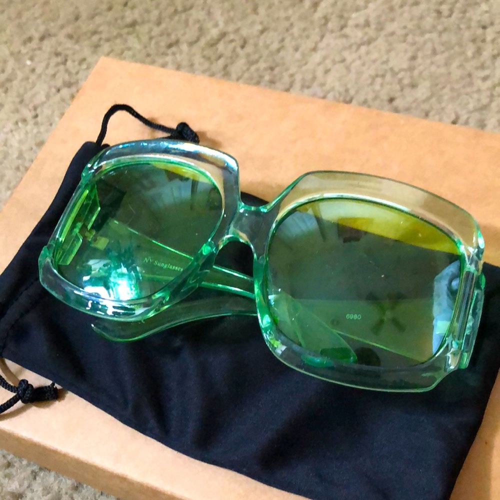 Oversized plastic green lens & frame sunglasses.